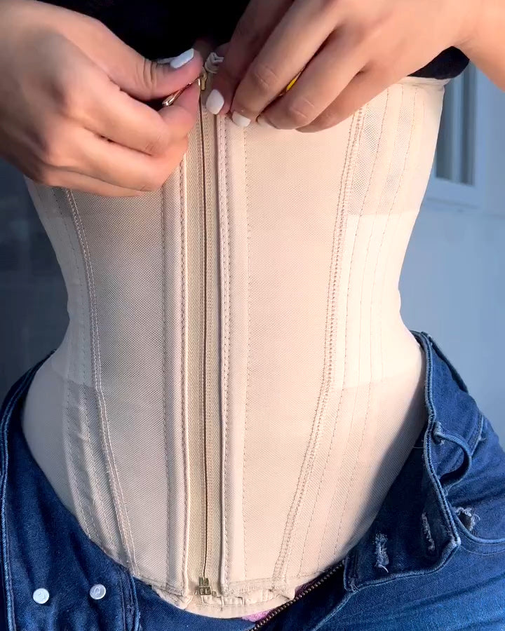 Camiseta sin mangas con cremallera y pecho