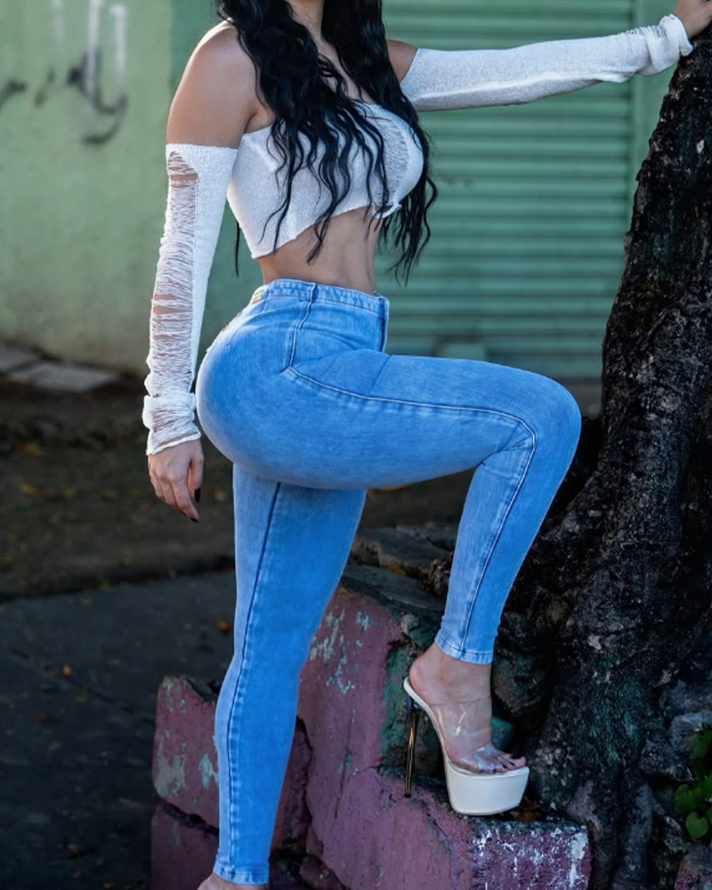 Jeans elásticos de cintura alta con cadena