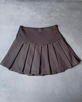Falda corta plisada mini