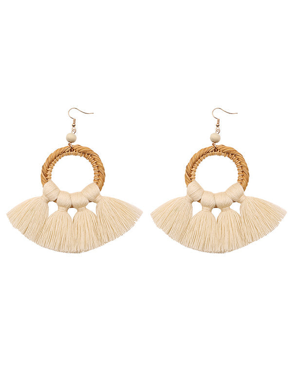 Pendientes bohemios de punto con borlas
