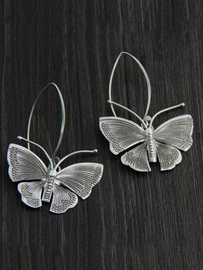 Pendientes de mariposa simples retro