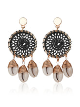 Pendientes vintage con círculo de caracola
