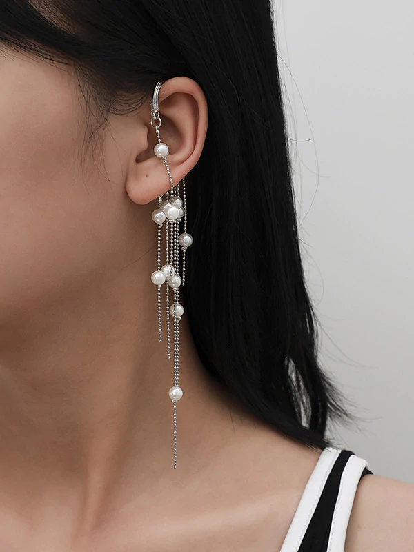 Pendientes de creatividad con borlas y decorados con cuentas elegantes