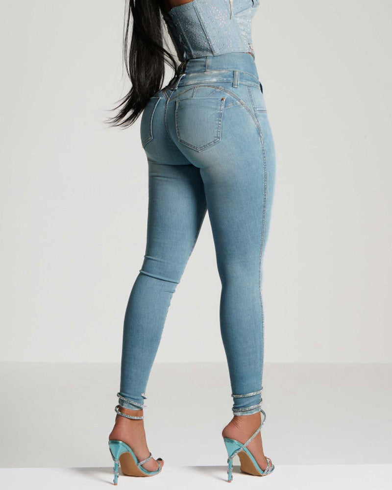 Jeans ajustados de cintura alta y cremallera trasera